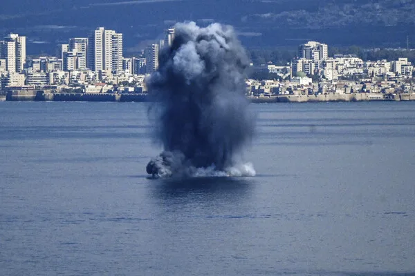 Hezbollah Launches Rocket Attack on Israeli Naval Base in Haifa, Marking Escalation in Tensions