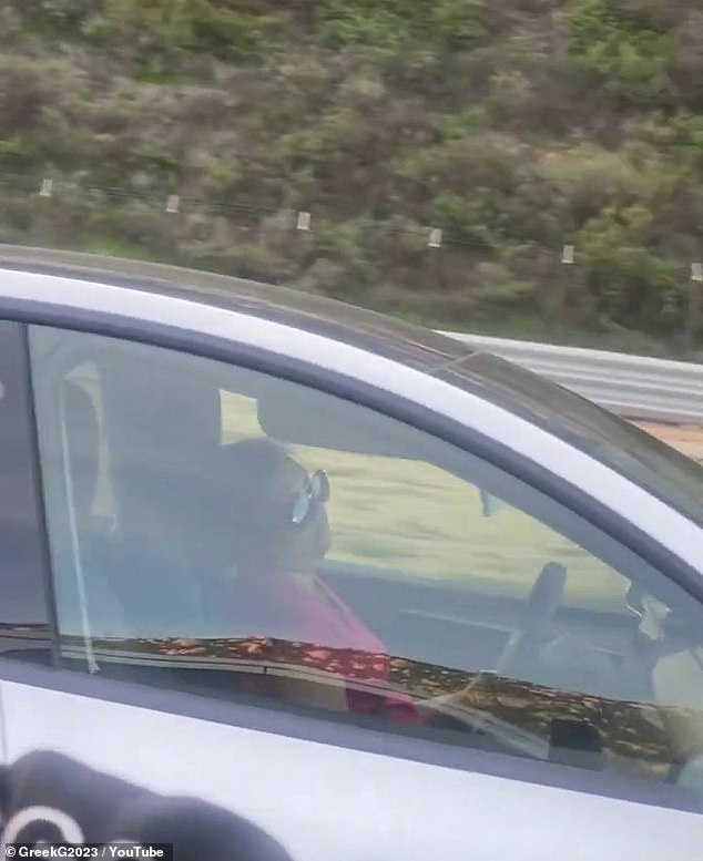 Shocking Video Shows Woman Sleeping Behind Wheel of Self-Driving Tesla, Raising Safety Concerns