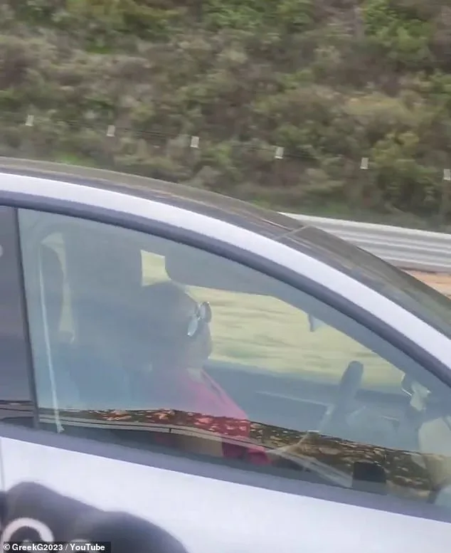 Shocking Video Shows Woman Sleeping Behind Wheel of Self-Driving Tesla, Raising Safety Concerns