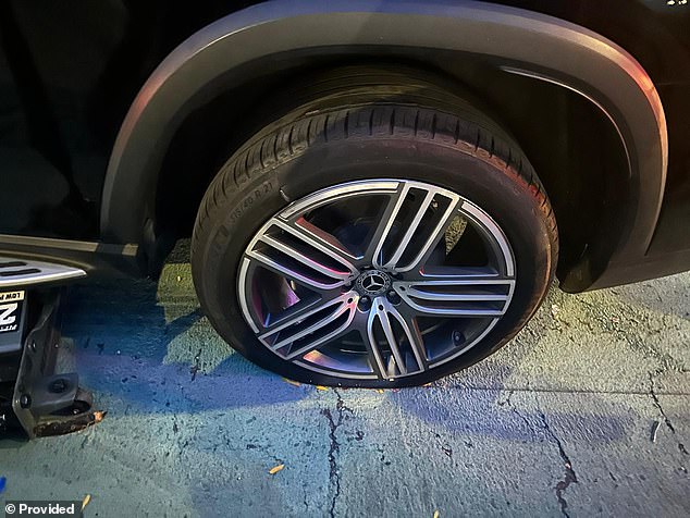 Brooklyn Tire Technician Rakes in Cash as Unaddressed Pothole Becomes Commuters' Nightmare