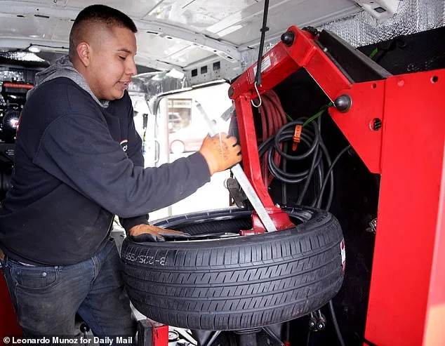 Brooklyn Tire Technician Rakes in Cash as Unaddressed Pothole Becomes Commuters' Nightmare