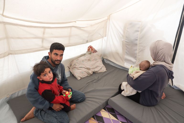 Gazans rely on smartphones for light as war destroys power grid.