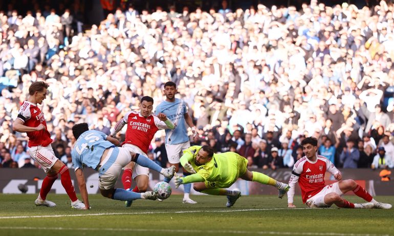 Haaland rescues Manchester City as Arsenal's title hopes fade.