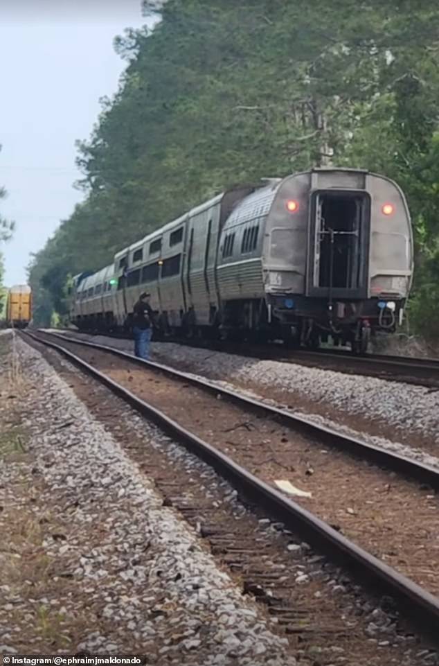 Amtrak train stranded for 19 hours after Florida brush fire blocks tracks.