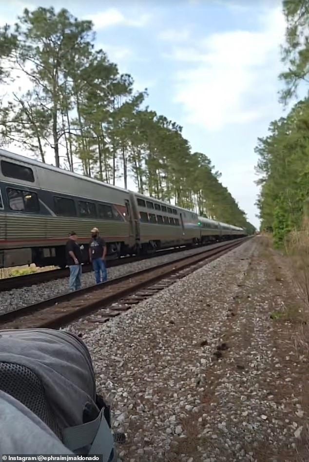 Amtrak train stranded for 19 hours after Florida brush fire blocks tracks.