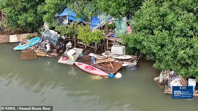 Hawaii clears massive two-story floating homeless encampment from Honolulu stream.