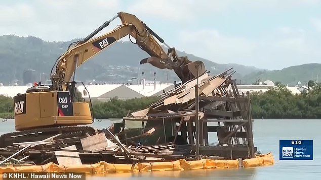 Hawaii clears massive two-story floating homeless encampment from Honolulu stream.