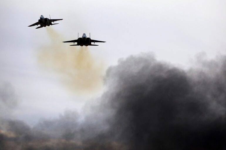 Israel Escalates Tensions with Iran Through Airstrikes on Central Military Sites
