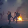 Exclusive Footage and Photos Capture Violent Standoff Between Police and Migrants in Gravelines, France