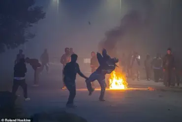 Exclusive Footage and Photos Capture Violent Standoff Between Police and Migrants in Gravelines, France