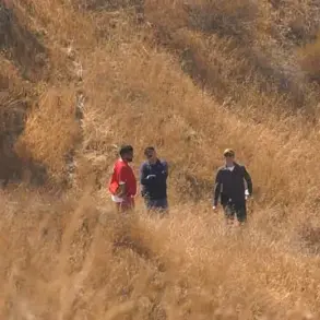 Stark Contrast: Father Arrested for Murder Seen Assisting Deputies in Search for Son's Remains